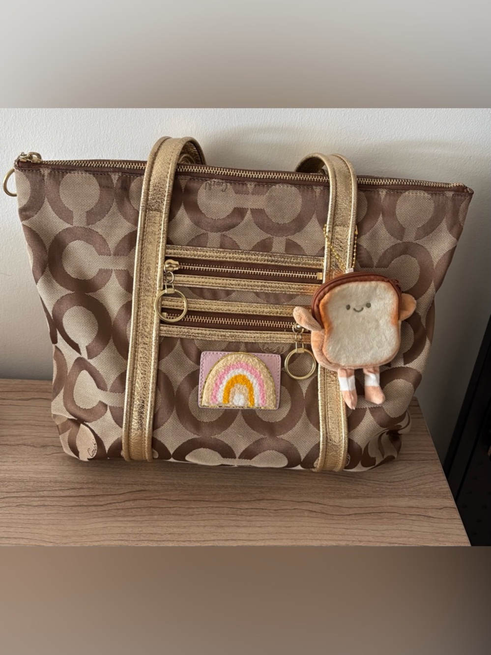 Coach Brown Signature Tote with Gold Straps and Pink Rainbow Patch